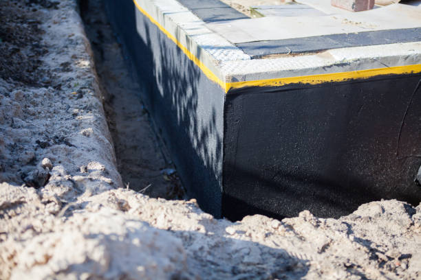 Professional Waterproofing technician working in Decatur, IL
